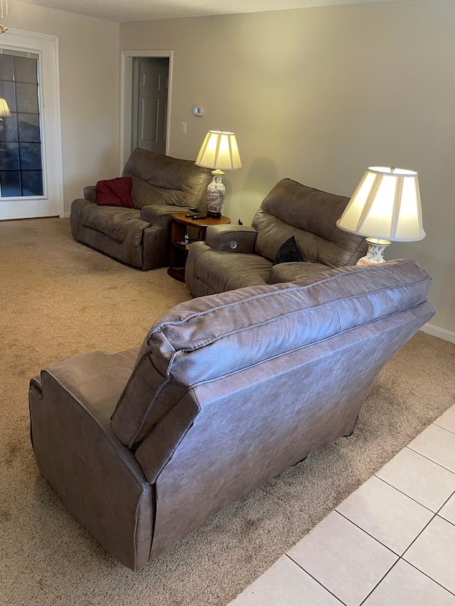 living room with tile patterned flooring