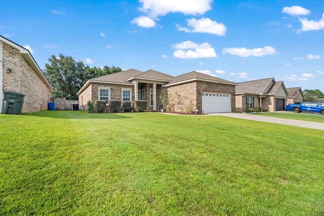 114 Bluffton Rd, Dothan, AL 36301 - view of front facade featuring brick siding, driveway, and a garage
