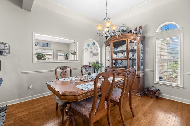 114 Bluffton Rd, Dothan, AL 36301 - dining space featuring a chandelier, wood finished floors, and plenty of natural light