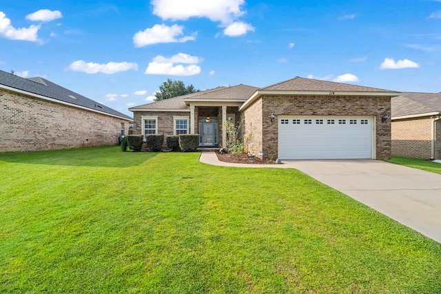 114 Bluffton Rd, Dothan, AL 36301 - view of front of property featuring a garage, brick siding, driveway, and a front yard