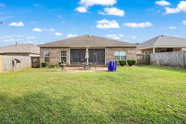 114 Bluffton Rd, Dothan, AL 36301 - back of house featuring brick siding, a fenced backyard, a patio, and ceiling fan