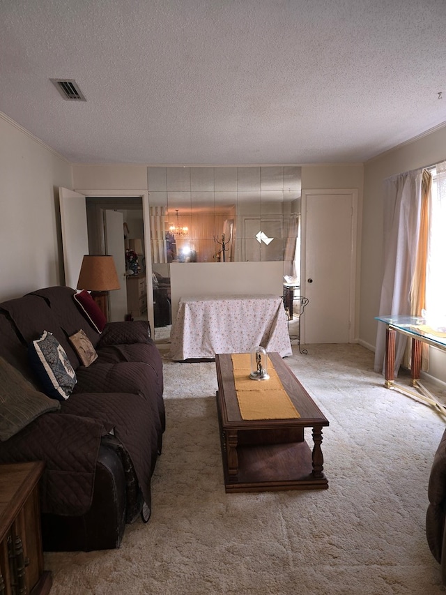 living room with carpet floors and a textured ceiling