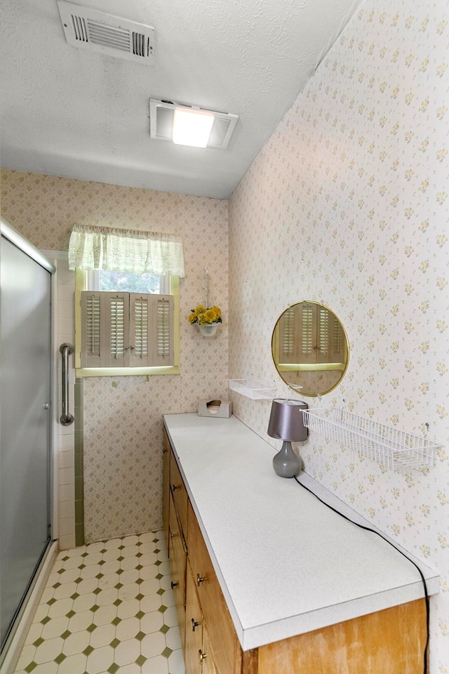155 Sharon Ln, Ozark, AL 36360 - bathroom with a shower stall, vanity, and tile patterned floors