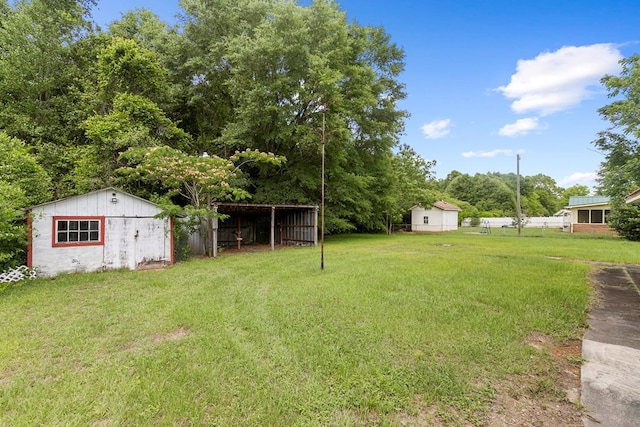 155 Sharon Ln, Ozark, AL 36360 - view of yard featuring an outbuilding
