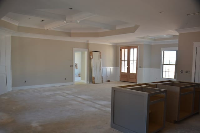 kitchen with ornamental molding and french doors