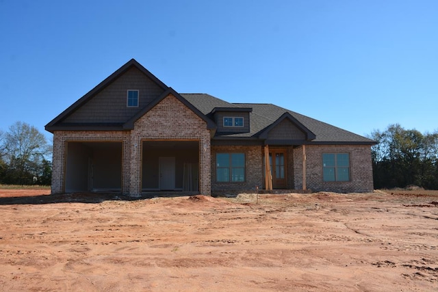 craftsman house with a garage