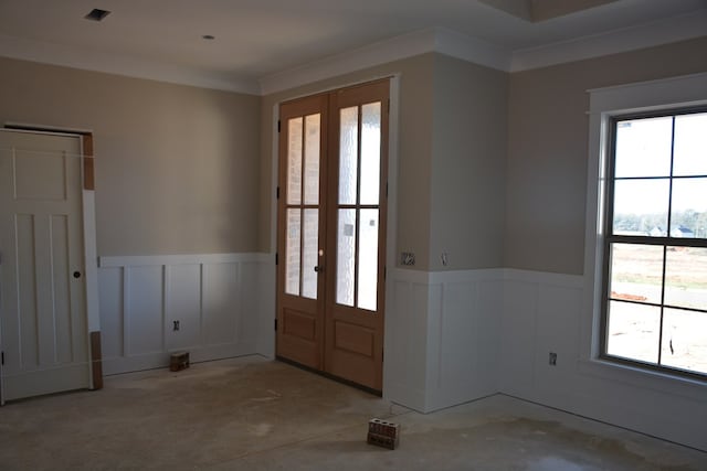 foyer entrance featuring french doors and ornamental molding