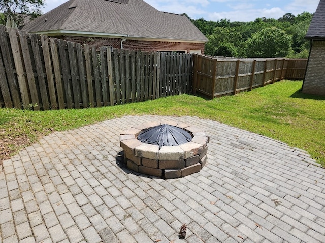 512 Gladstone Way, Dothan, AL 36305 - view of patio featuring an outdoor fire pit