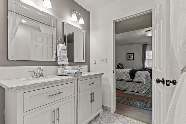 bathroom featuring vanity and tile patterned flooring