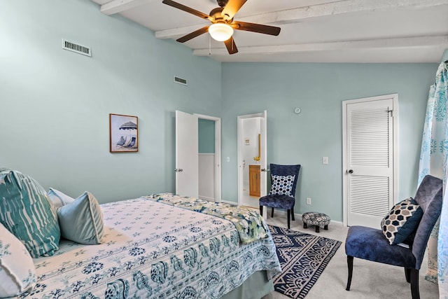 carpeted bedroom with ceiling fan and vaulted ceiling with beams