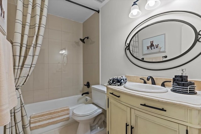 full bathroom featuring toilet, vanity, and shower / bath combination with curtain