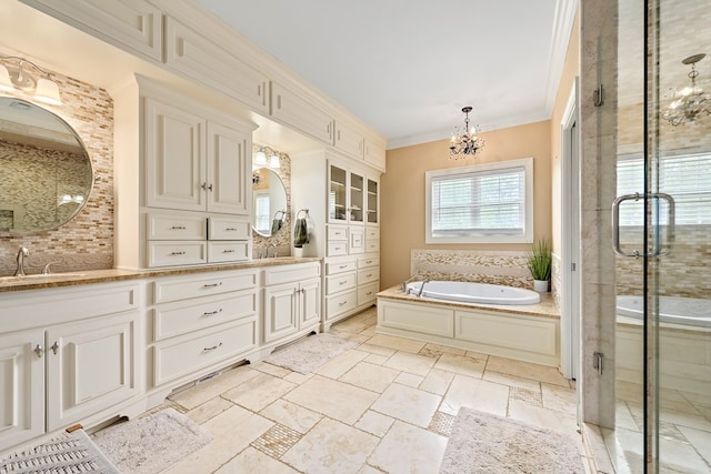 4 Woodmere Dr, Dothan, AL 36305 - full bath featuring a chandelier, double vanity, a bath, a shower stall, and stone tile floors