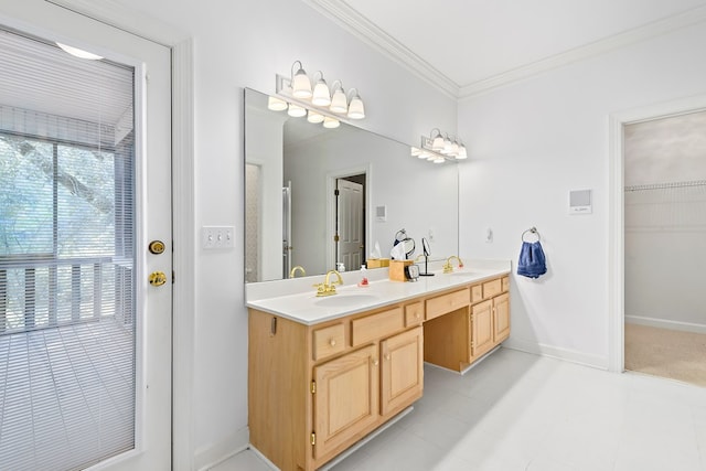 4 Woodmere Dr, Dothan, AL 36305 - bathroom with double vanity, ornamental molding, and a walk in closet