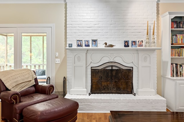 4 Woodmere Dr, Dothan, AL 36305 - living area with crown molding, a brick fireplace, and wood finished floors