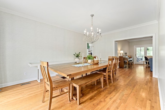 4 Woodmere Dr, Dothan, AL 36305 - dining room with a chandelier, light wood-style floors, and ornamental molding