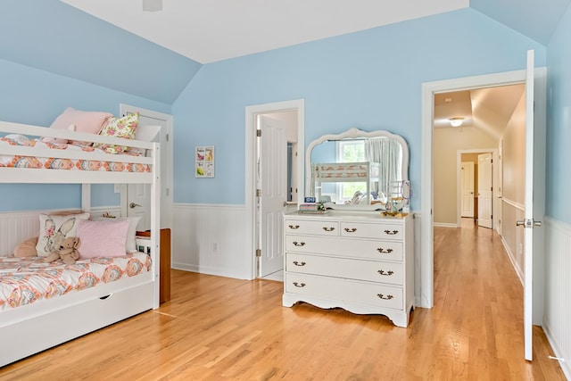 4 Woodmere Dr, Dothan, AL 36305 - bedroom featuring vaulted ceiling, light wood-type flooring, and wainscoting