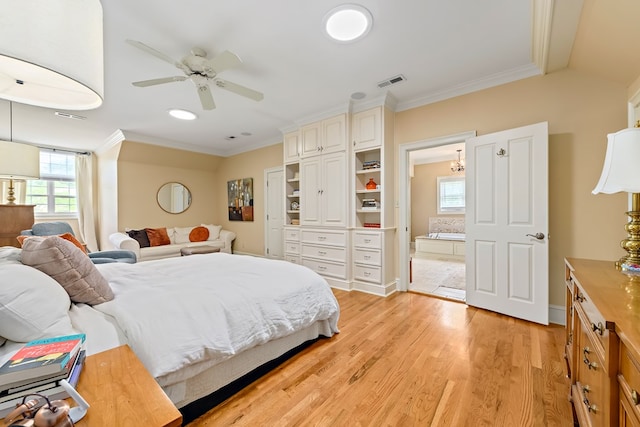 4 Woodmere Dr, Dothan, AL 36305 - bedroom with ornamental molding, multiple windows, light wood-style flooring, connected bathroom, and ceiling fan