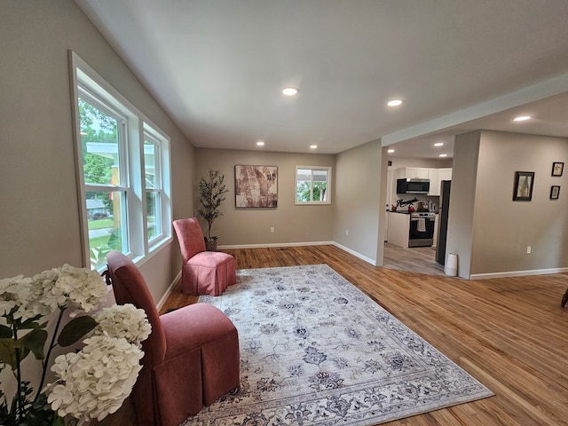 276 Fairview, Ozark, AL 36360 - living room with light wood finished floors and recessed lighting