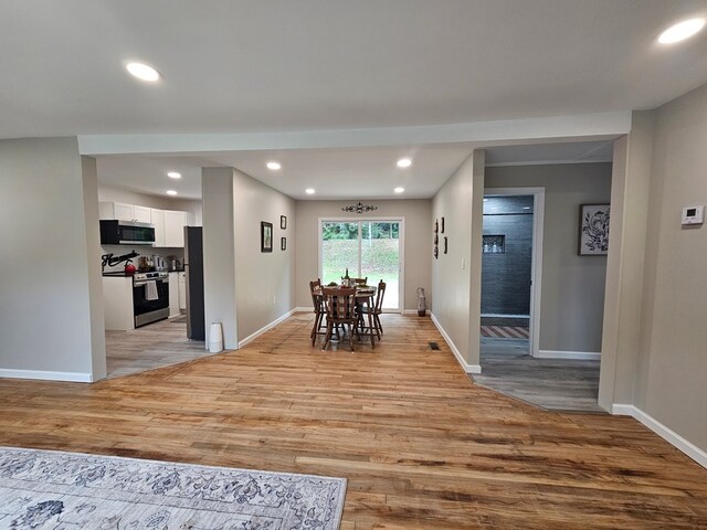 276 Fairview, Ozark, AL 36360 - dining area with light wood finished floors and recessed lighting