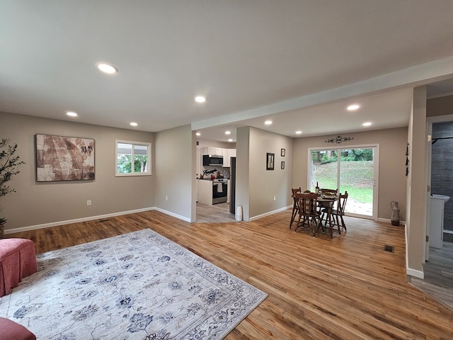 276 Fairview, Ozark, AL 36360 - living room with plenty of natural light, light wood-style floors, and recessed lighting