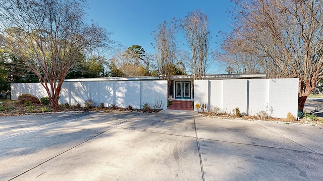 view of front of house featuring brick siding