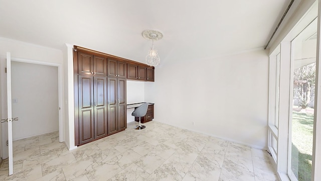 interior space with baseboards, marble finish floor, ornamental molding, and a notable chandelier
