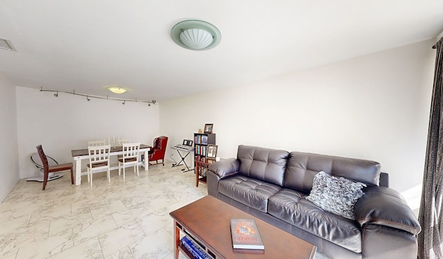 living area with marble finish floor