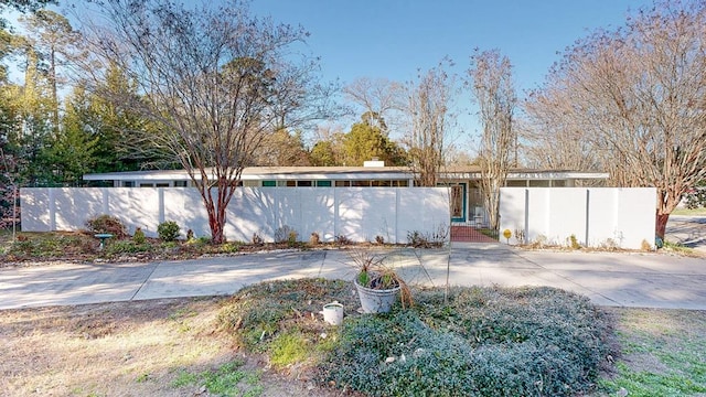 exterior space with a fenced front yard