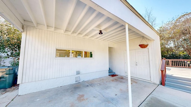 exterior space featuring a patio, crawl space, and a wooden deck