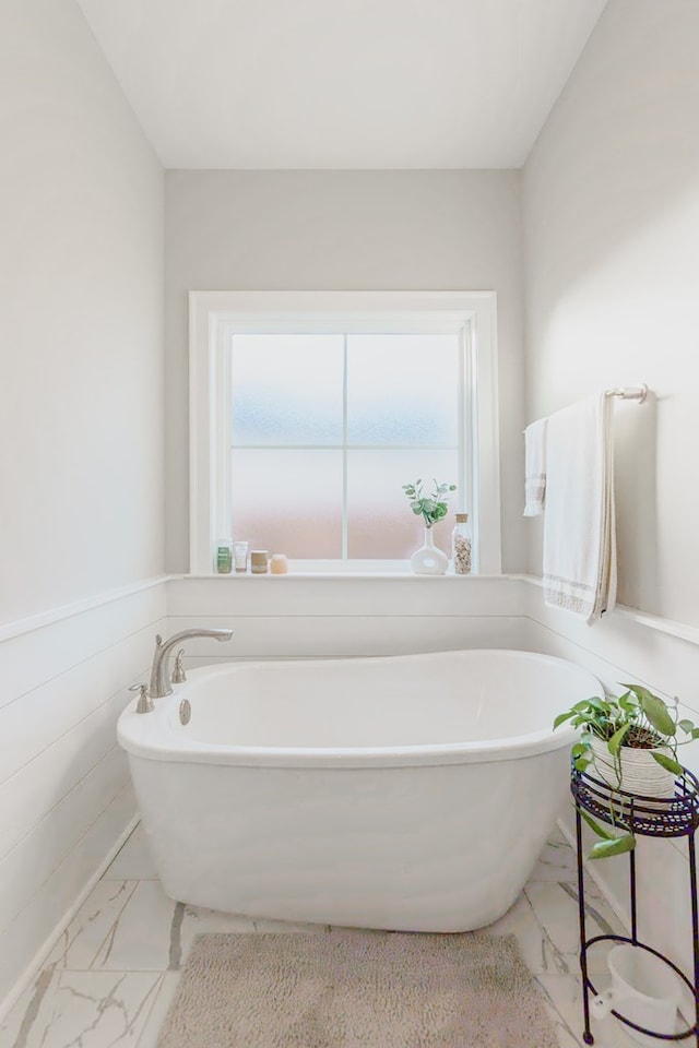 bathroom with a tub