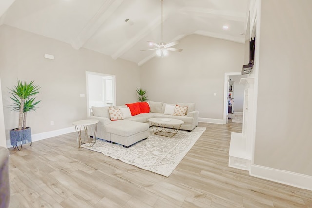 living room with high vaulted ceiling, ceiling fan, a fireplace, beamed ceiling, and light hardwood / wood-style floors