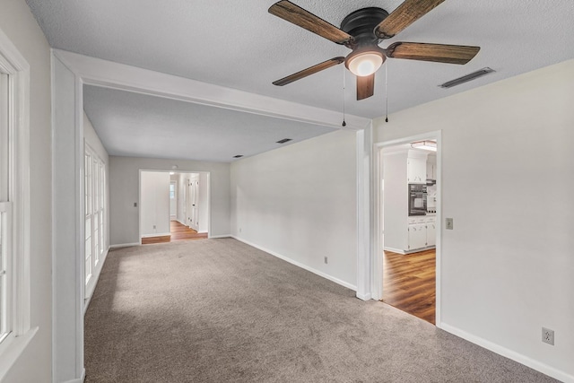 351 Hayborn Rd, Webb, AL 36376 - carpeted empty room with a ceiling fan and baseboards