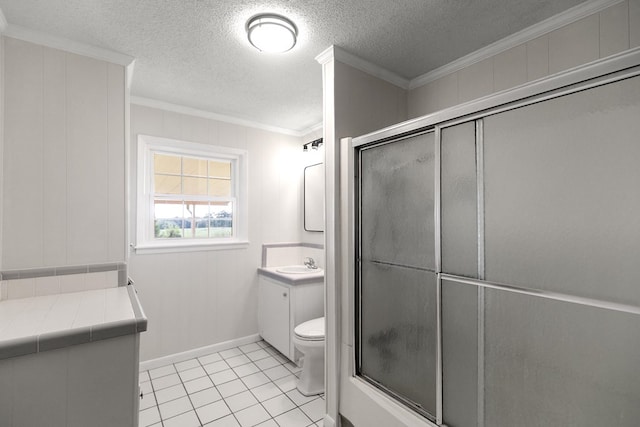 351 Hayborn Rd, Webb, AL 36376 - bathroom with crown molding, vanity, tile patterned floors, a textured ceiling, and combined bath / shower with glass door