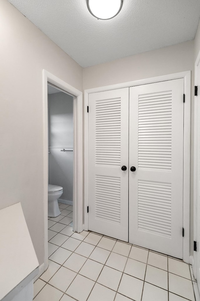 351 Hayborn Rd, Webb, AL 36376 - hallway with light tile patterned flooring