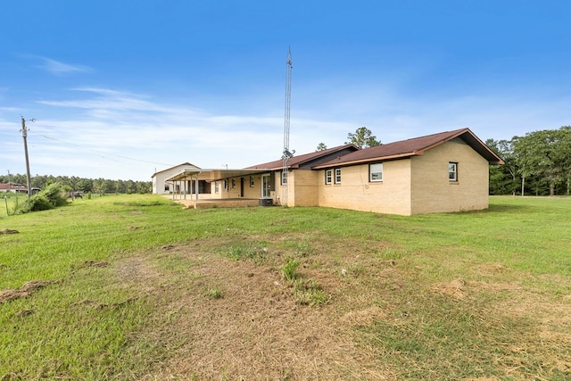 351 Hayborn Rd, Webb, AL 36376 - rear view of property with a yard