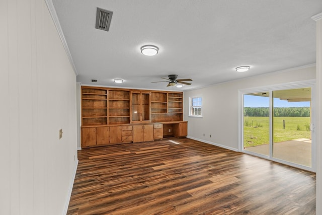 351 Hayborn Rd, Webb, AL 36376 - unfurnished living room with ornamental molding, ceiling fan, dark wood-style flooring, and a textured ceiling