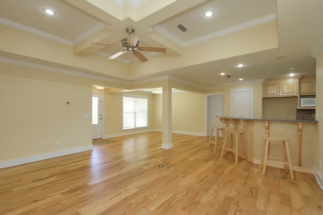 unfurnished living room with light wood-type flooring, ornamental molding, coffered ceiling, and baseboards