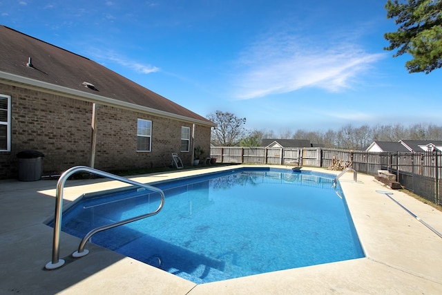 view of pool featuring a fenced in pool, a patio area, and a fenced backyard