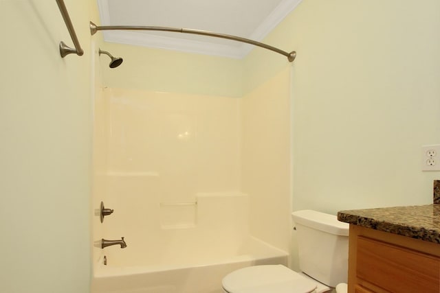 full bath featuring crown molding, vanity, toilet, and bathing tub / shower combination