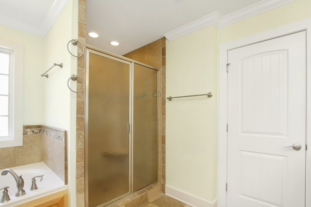 full bathroom featuring a stall shower, recessed lighting, a bath, and crown molding