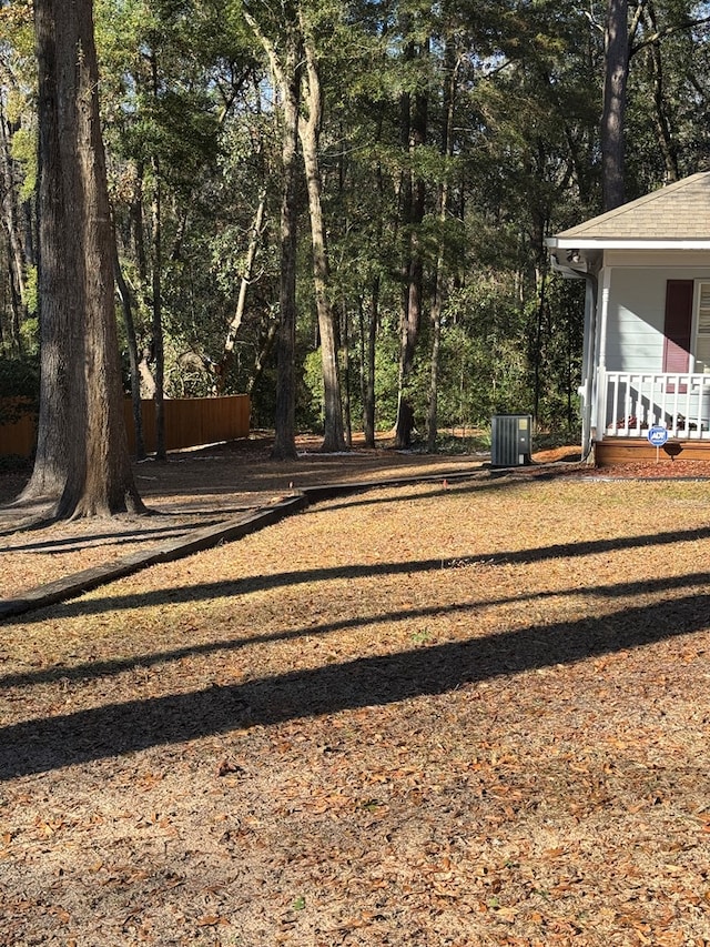 view of yard featuring central AC