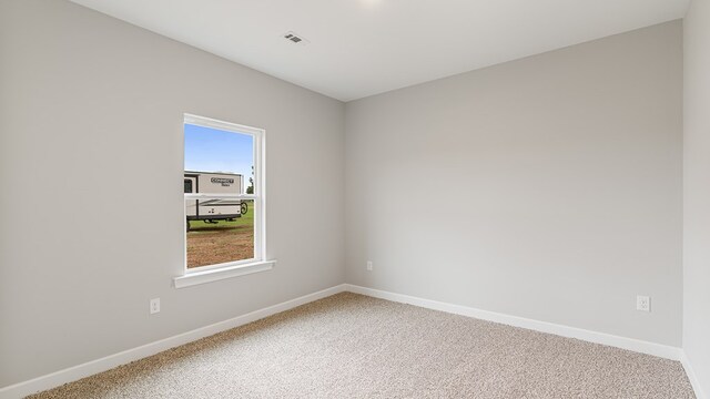 308 Heritage Way, Headland, AL 36345 - carpeted empty room with visible vents and baseboards