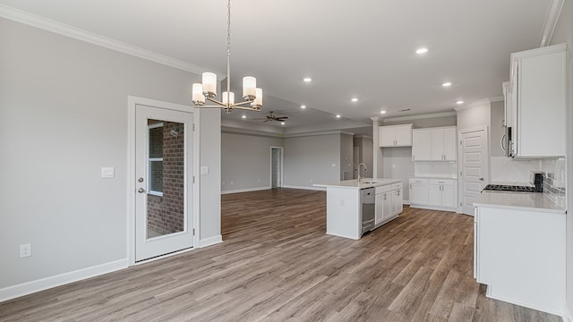 308 Heritage Way, Headland, AL 36345 - kitchen featuring a center island with sink, appliances with stainless steel finishes, open floor plan, light wood-style floors, and a sink