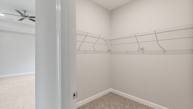 308 Heritage Way, Headland, AL 36345 - spacious closet featuring a ceiling fan and carpet flooring