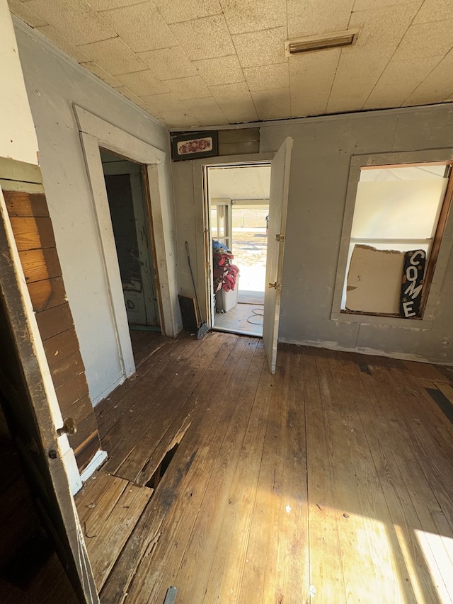 hallway featuring dark hardwood / wood-style floors