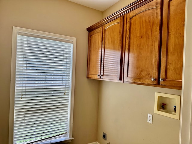 208 Planters Ct, Enterprise, AL 36330 - washroom featuring hookup for an electric dryer, cabinet space, and hookup for a washing machine
