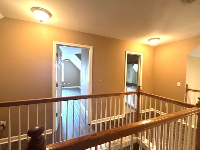 208 Planters Ct, Enterprise, AL 36330 - corridor featuring lofted ceiling and an upstairs landing