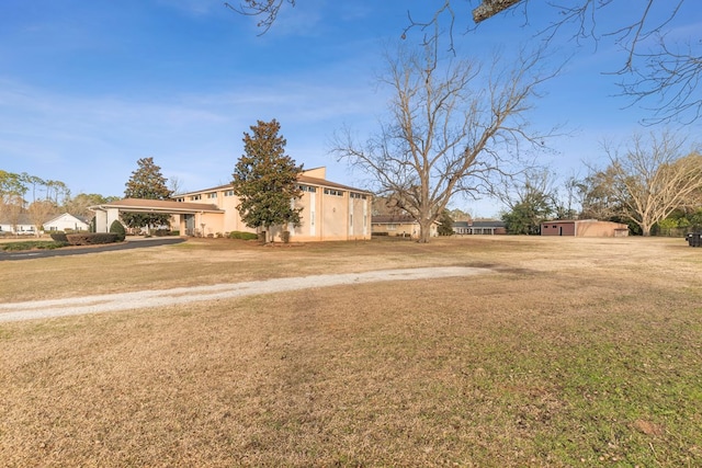 2054 John D Odom Rd, Dothan, AL 36303 - view of green lawn featuring a carport