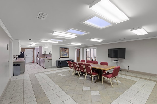 2054 John D Odom Rd, Dothan, AL 36303 - dining space featuring light tile patterned flooring, ornamental molding, and baseboards