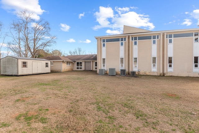 2054 John D Odom Rd, Dothan, AL 36303 - back of house featuring central AC and a lawn